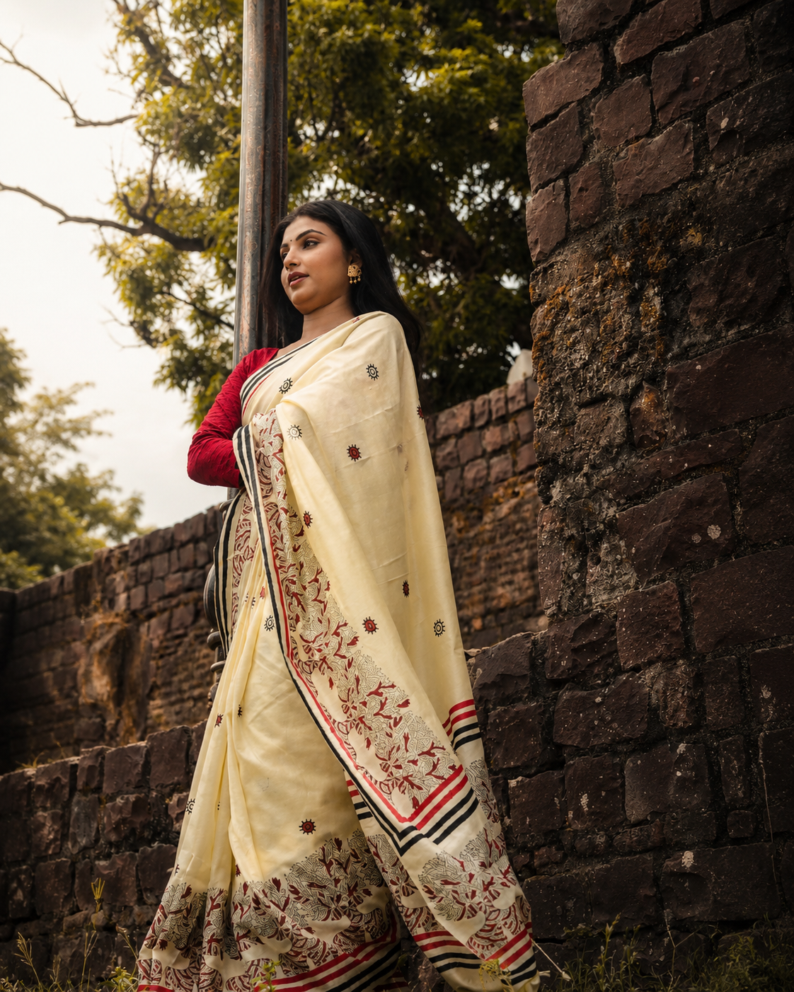 Ivory Pure Silk Saree Outdoor Editorial Look Woman wearing ivory pure silk hand printed saree outdoors