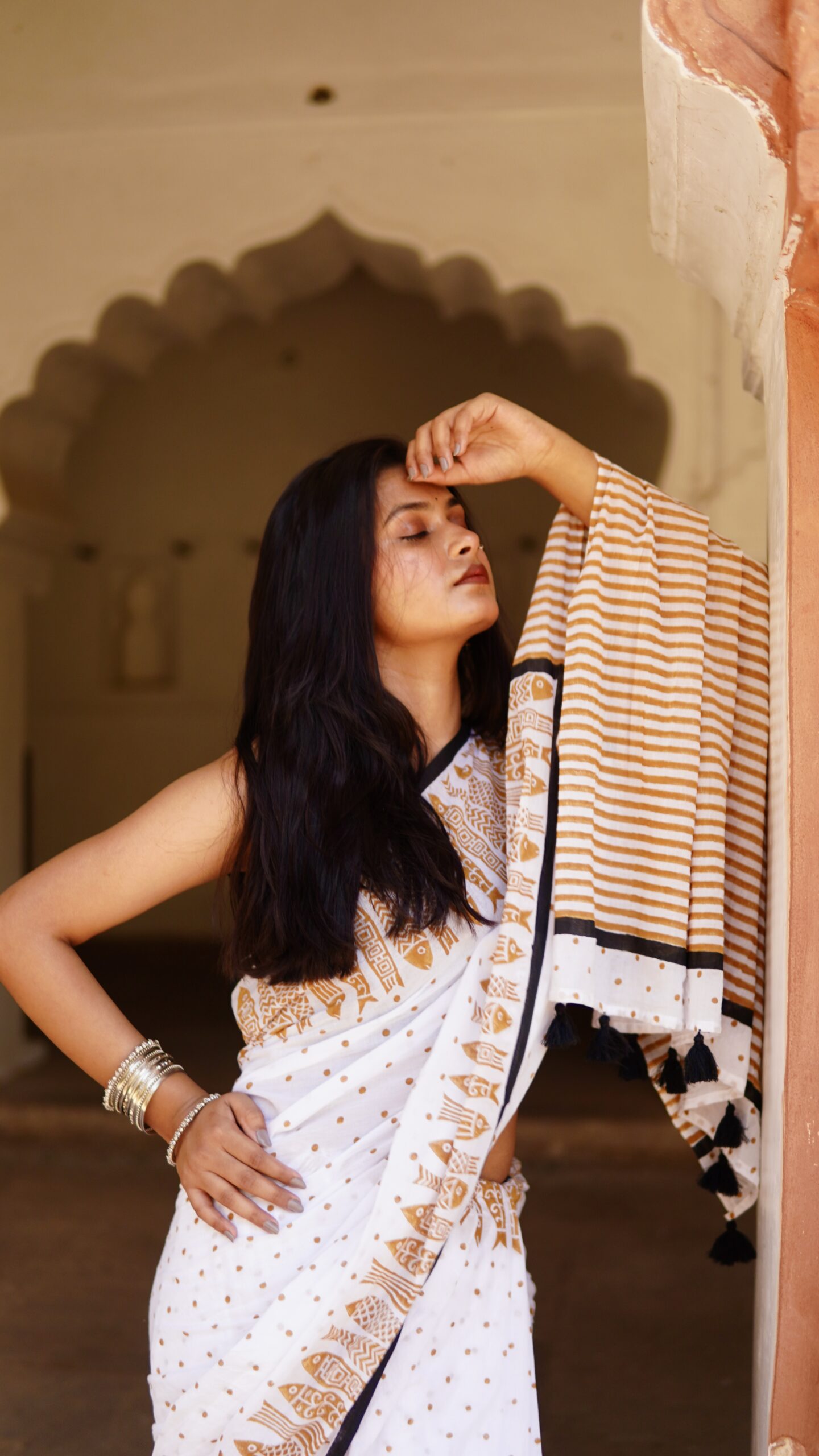 Hand Block Print Mul Cotton Saree Worn Woman wearing white mustard hand block print mul cotton saree