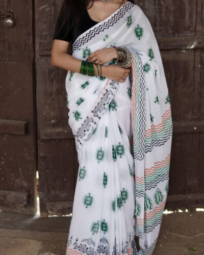 : Hand block printed mul cotton saree with green floral motif and geometric border design
