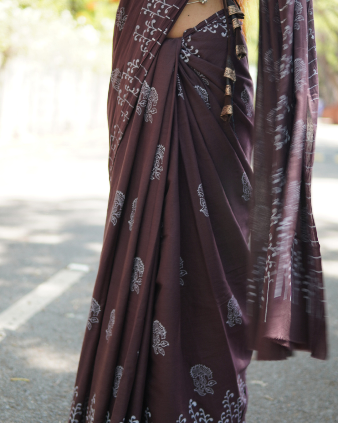Midnight Plum Hand Block Printed Mul Cotton Saree - Pleats Detail Pleats and drape detail of Midnight Plum Hand Block Printed Mul Cotton Saree with handcrafted floral motifs
