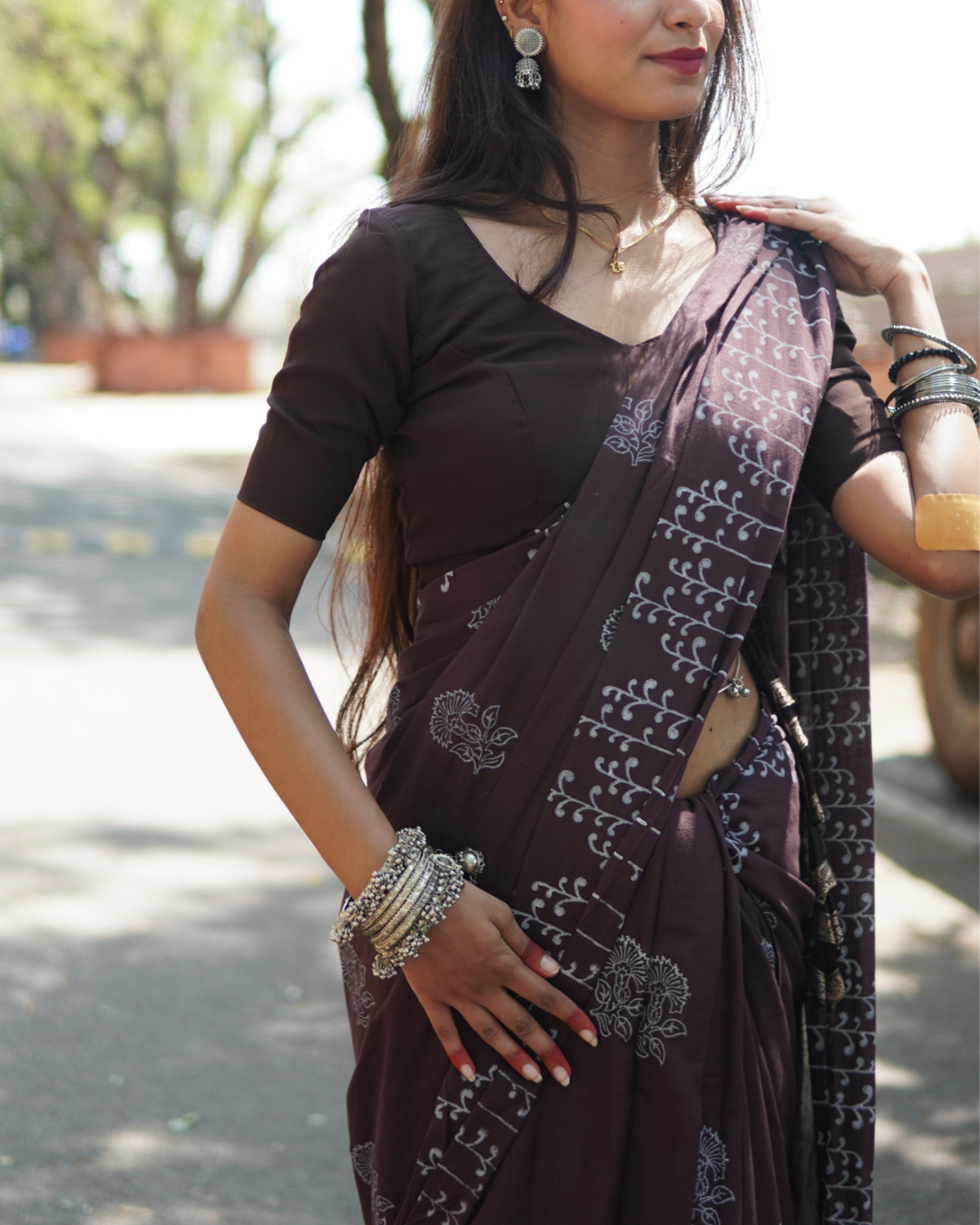 Midnight Plum Hand Block Printed Mul Cotton Saree - Styling View Midnight Plum Hand Block Printed Mul Cotton Saree styled with matching blouse and floral motifs