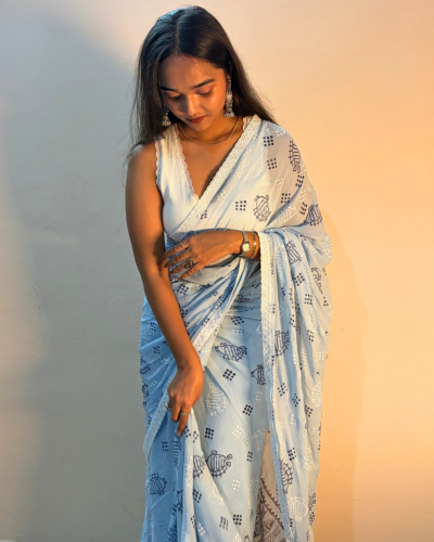 Light blue printed georgette saree with navy motifs