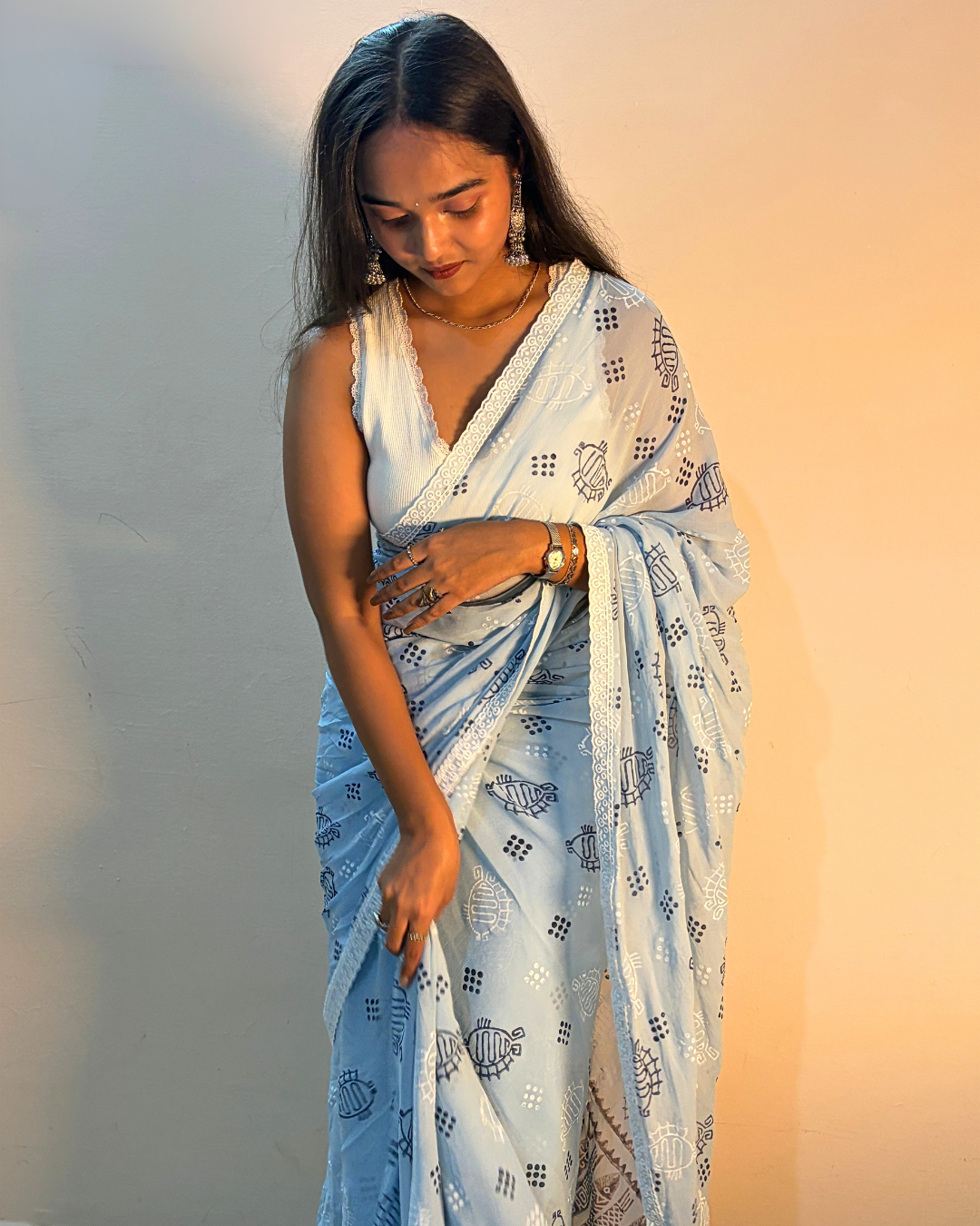 Light blue printed georgette saree with navy motifs