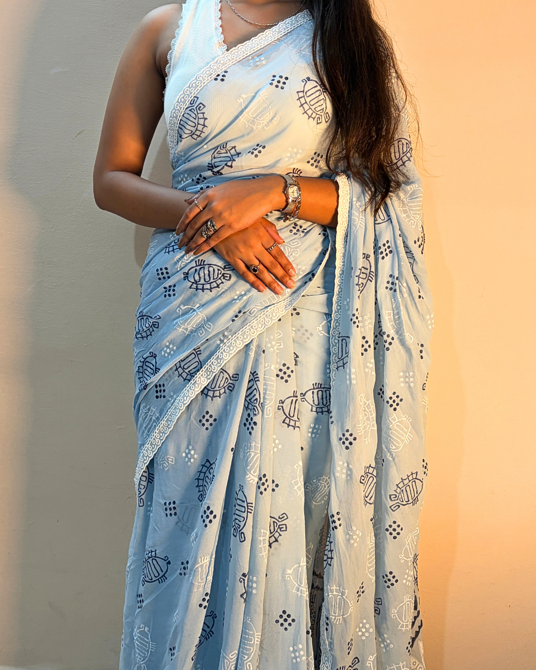 Light blue printed georgette saree with traditional motifs