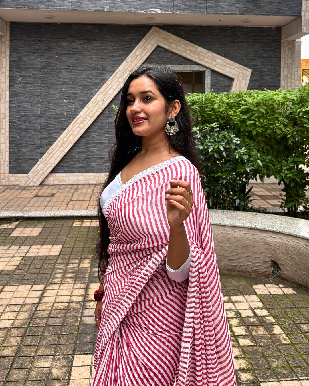 Pink and White Striped Georgette Saree Pink and white striped Georgette saree side view