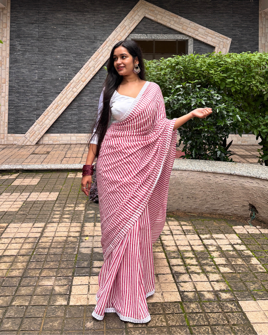 Pink and White Striped Georgette Saree Full length pink and white striped Georgette saree