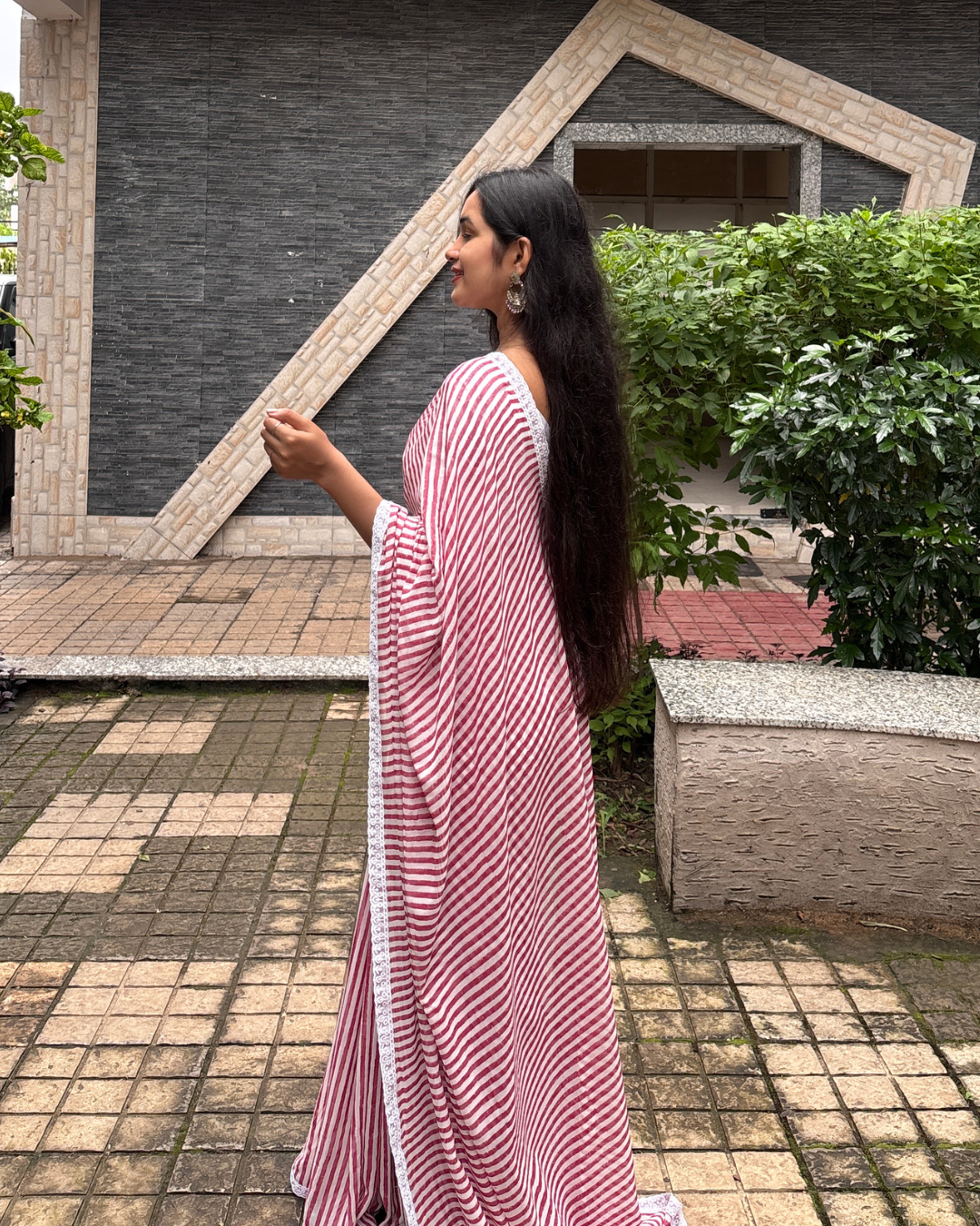 Pink and White Striped Georgette Saree Back view of pink and white striped Georgette saree